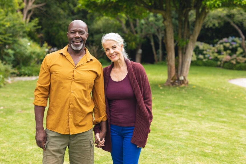 A retired couple overlooking a scenic vista, representing the stability and confidence of inflation-proof financial planning.A retired couple overlooking a scenic vista, representing the stability and confidence of inflation-proof financial planning.