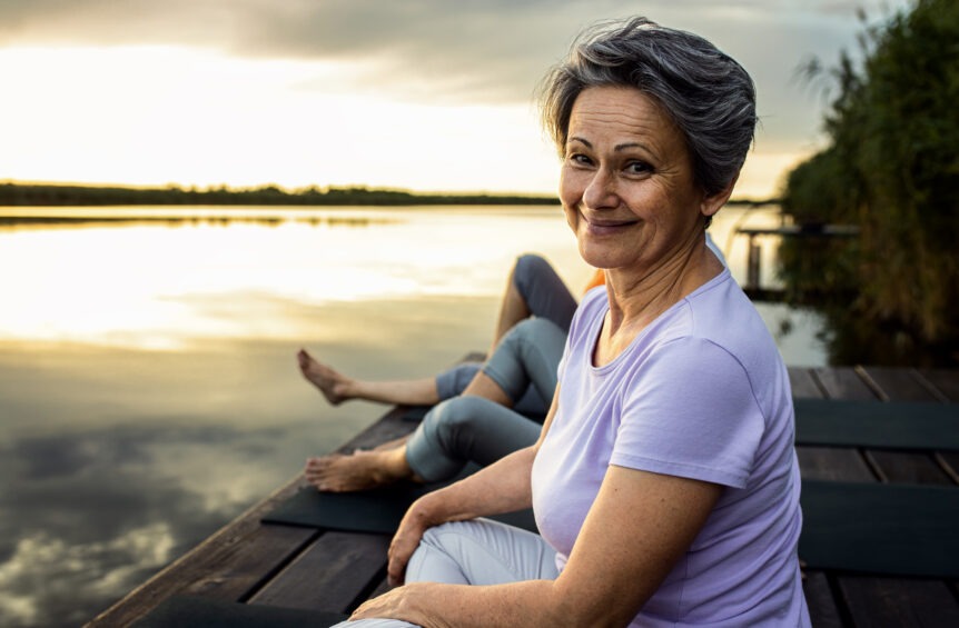 Retirees overlooking a serene landscape representing security from effective retirement income strategies.