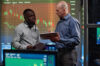 Brokerage specialist discussing market data